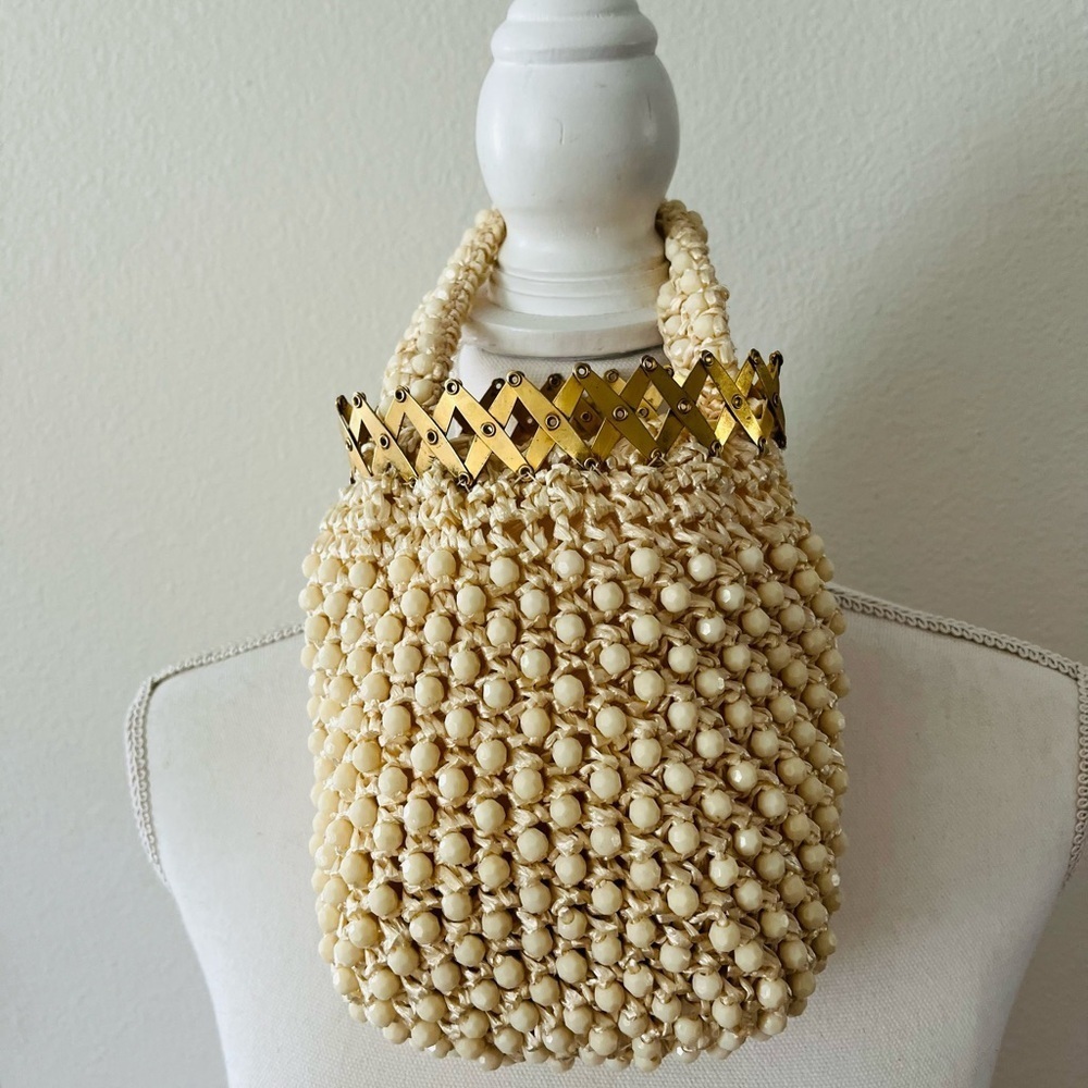 Elegant Cream Beaded Handbag with Gold Accents